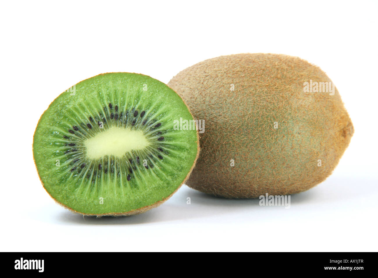 hole and half kiwi fruit isolated on white background healthy eating and agriculture concepts Stock Photo