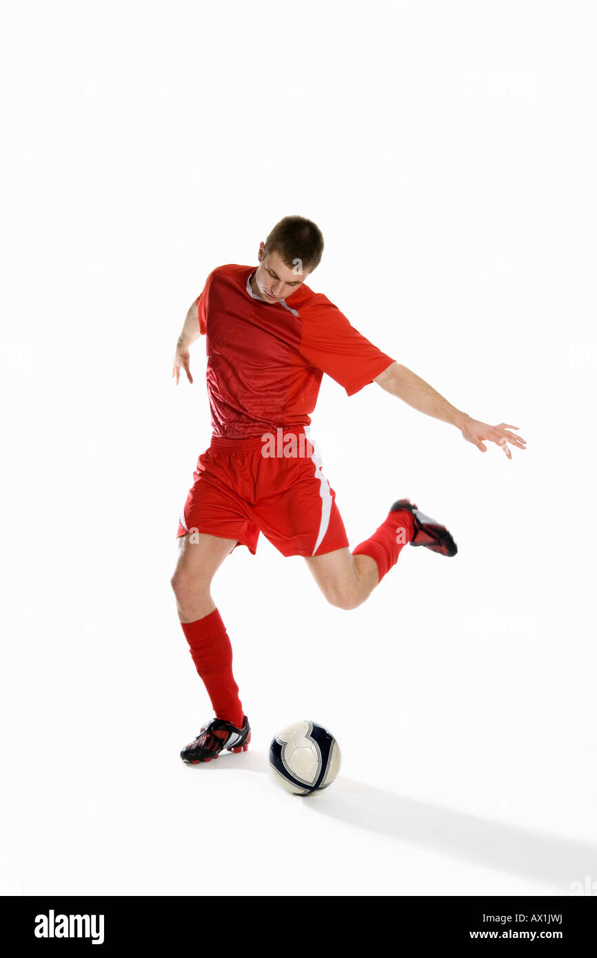 Footballer kicking ball hires stock photography and images Alamy
