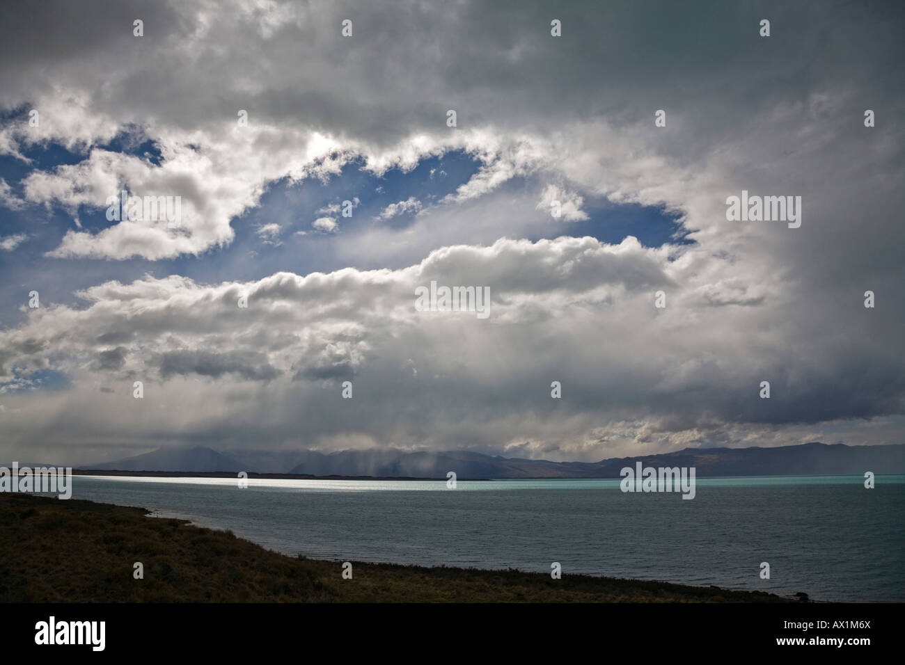 Rain clouds over the lake Lago Argentino, national park Los Glaciares, (Parque Nacional Los Glaciares), Patagonia, Argentina, S Stock Photo