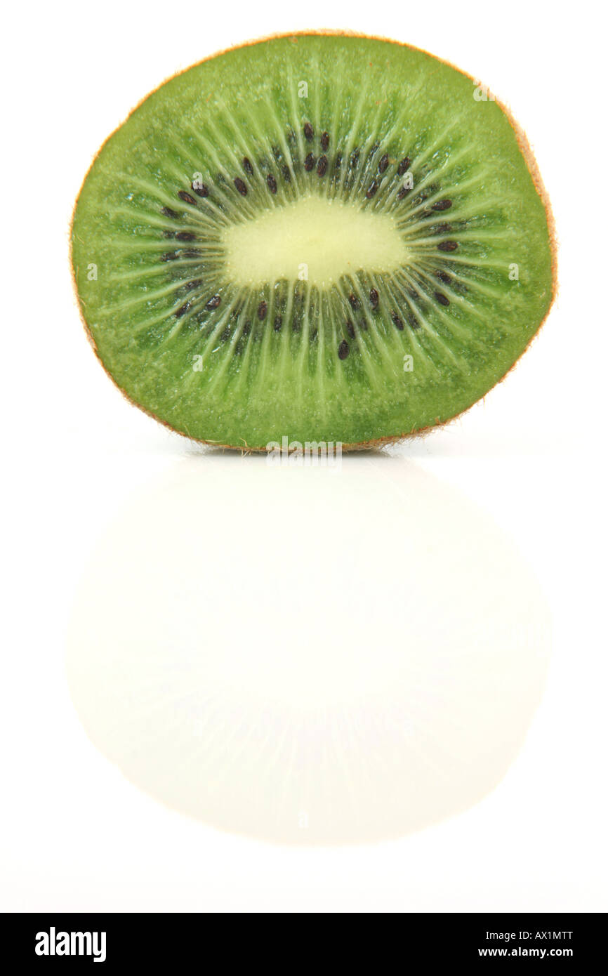 half kiwi fruit with reflection isolated on white background healthy eating and agriculture concepts Stock Photo