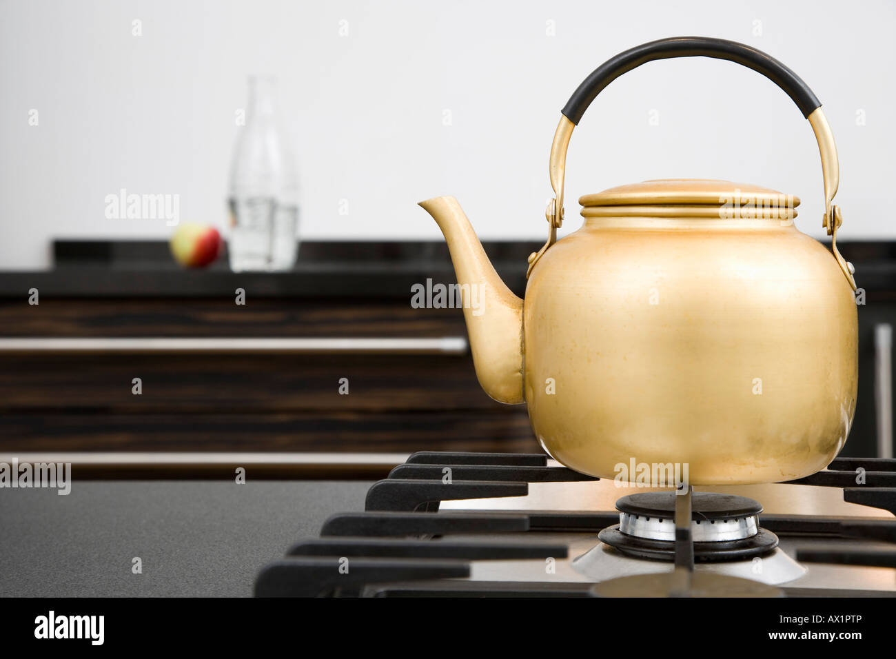 A kettle on a hob Stock Photo Alamy