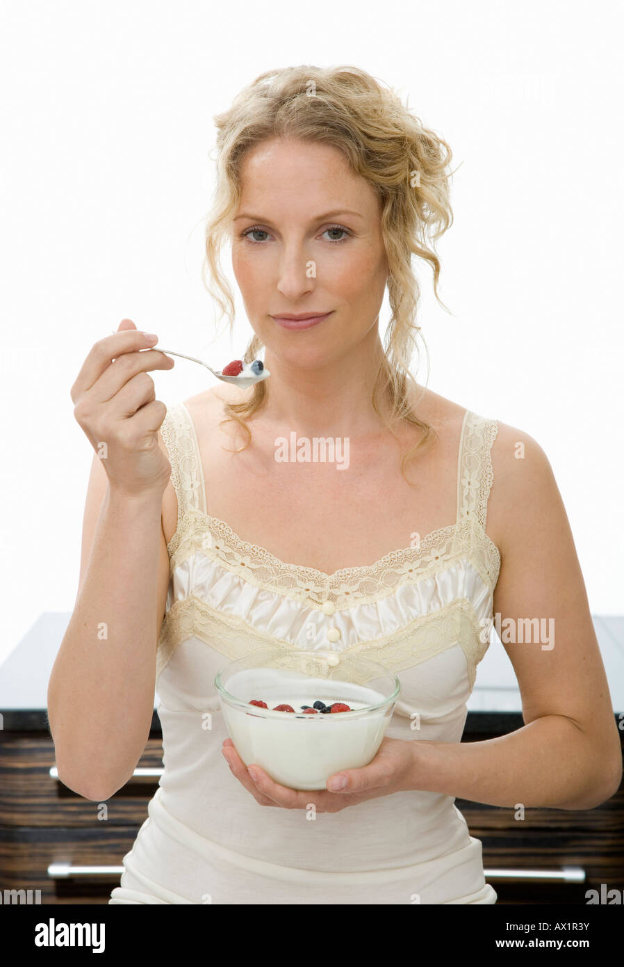 Woman mouth eating raspberry hi-res stock photography and images - Alamy