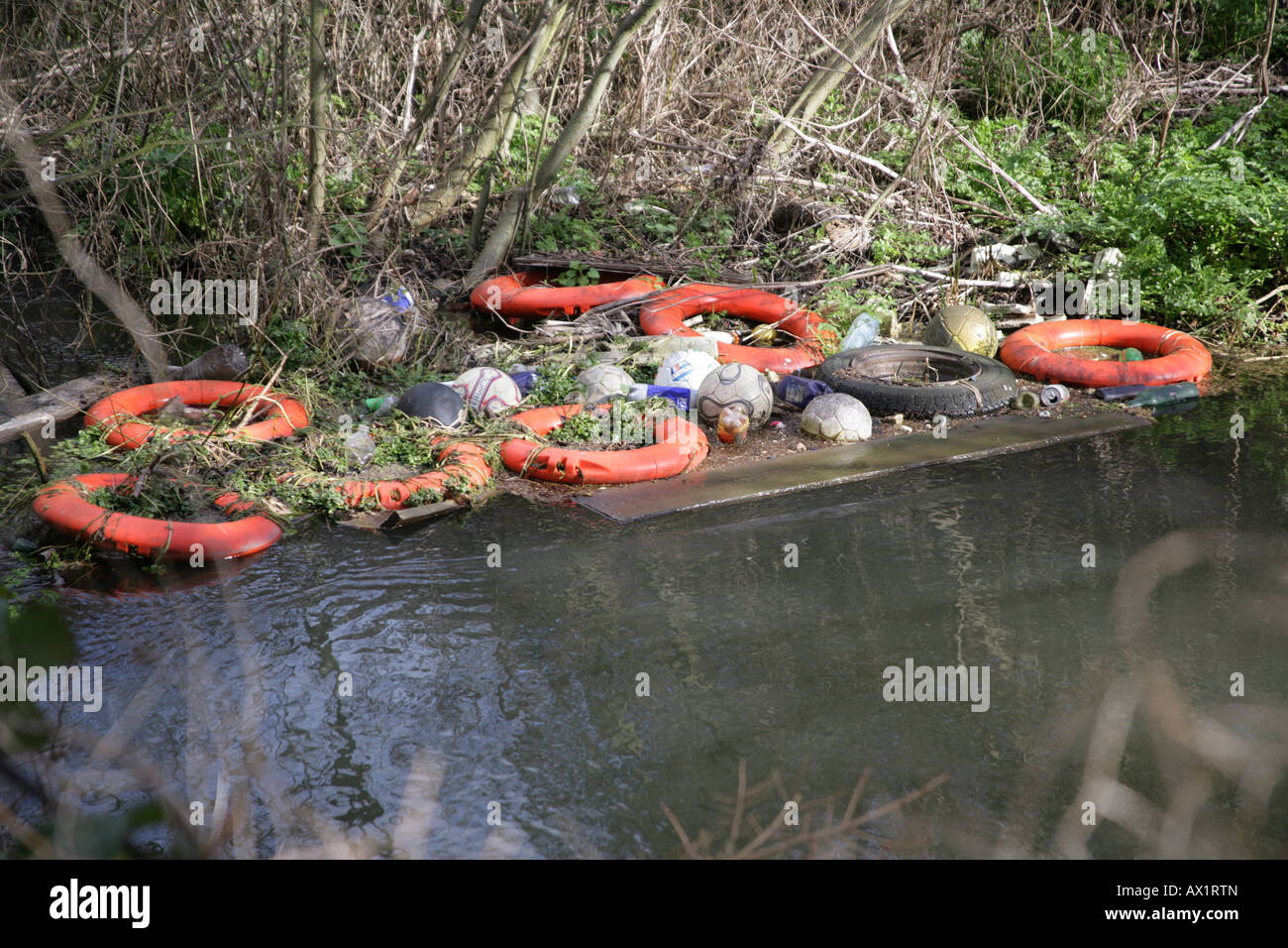 Rubbish in the river 1 Stock Photo - Alamy