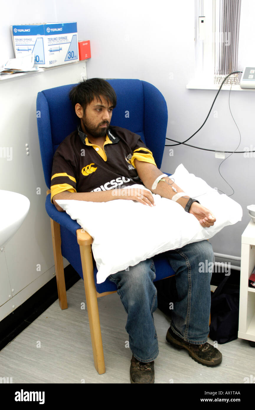 Patient receiving drug Stock Photo - Alamy