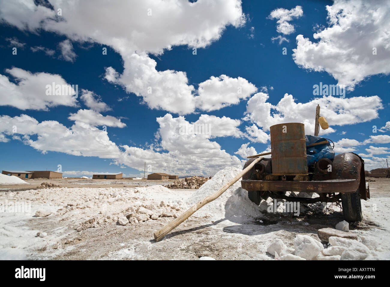 Old car at the village marginally, Salt lake Salar de Uyuni, Altiplano, Bolivia, South America Stock Photo