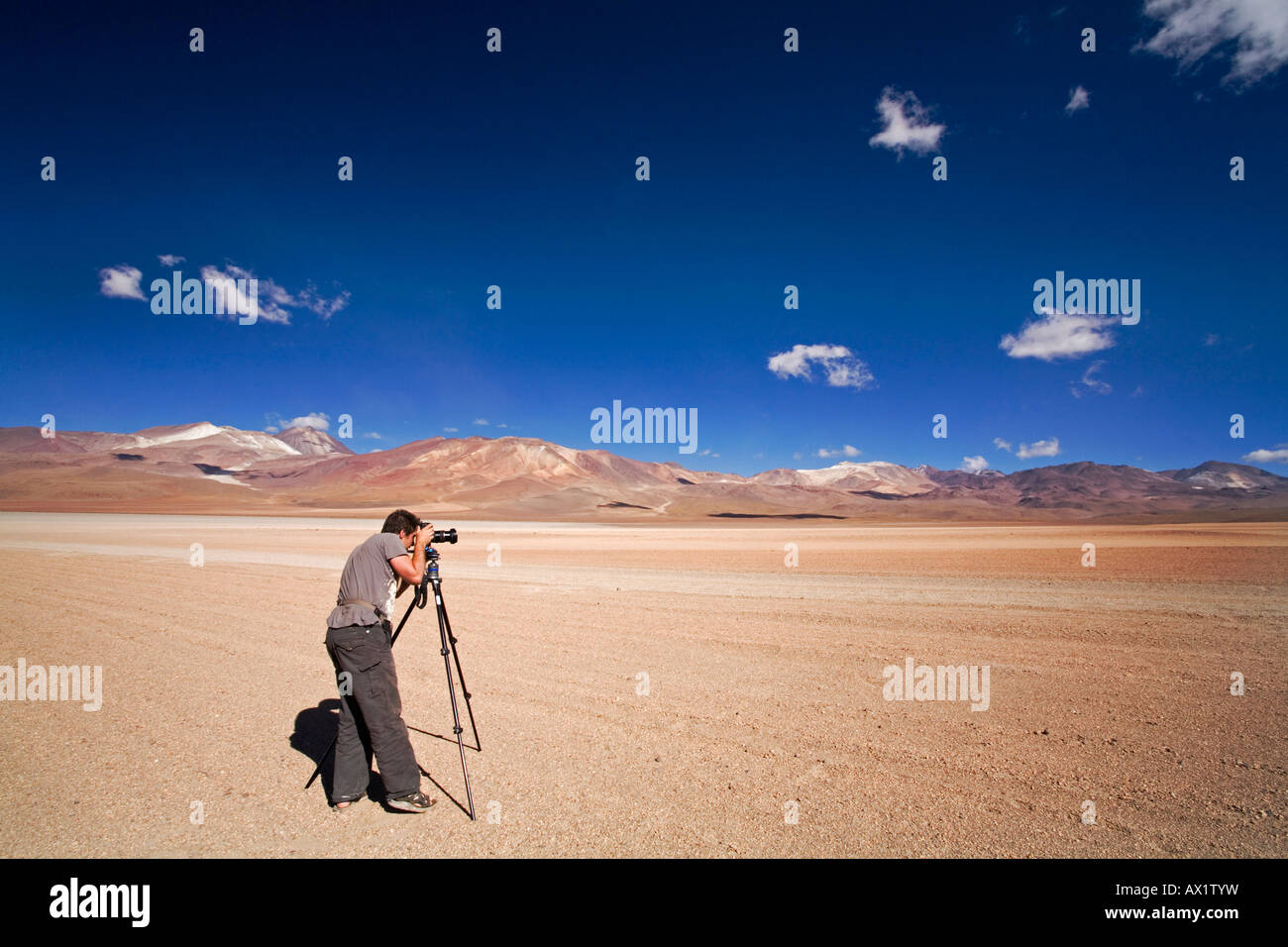 Photographer take pictures from multi-colored mountains, Altiplano, Bolivia, South America Stock Photo