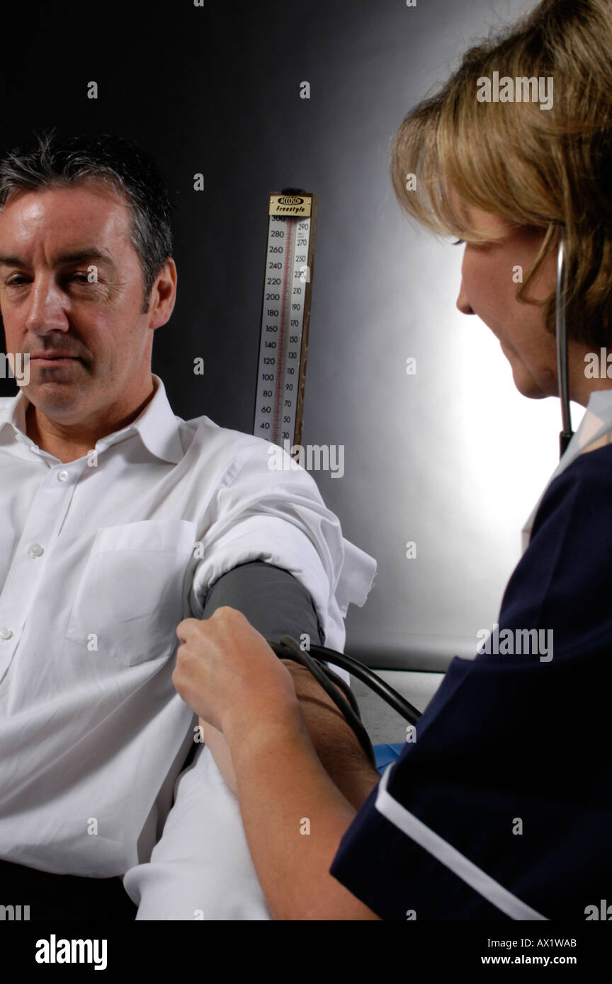 Blood pressure being taken hi-res stock photography and images - Alamy