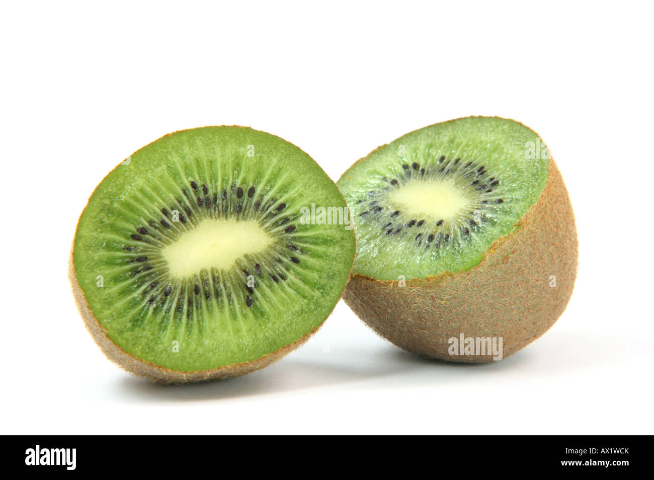 kiwi fruit cuted in two halfs isolated on white background healthy eating and agriculture concepts Stock Photo