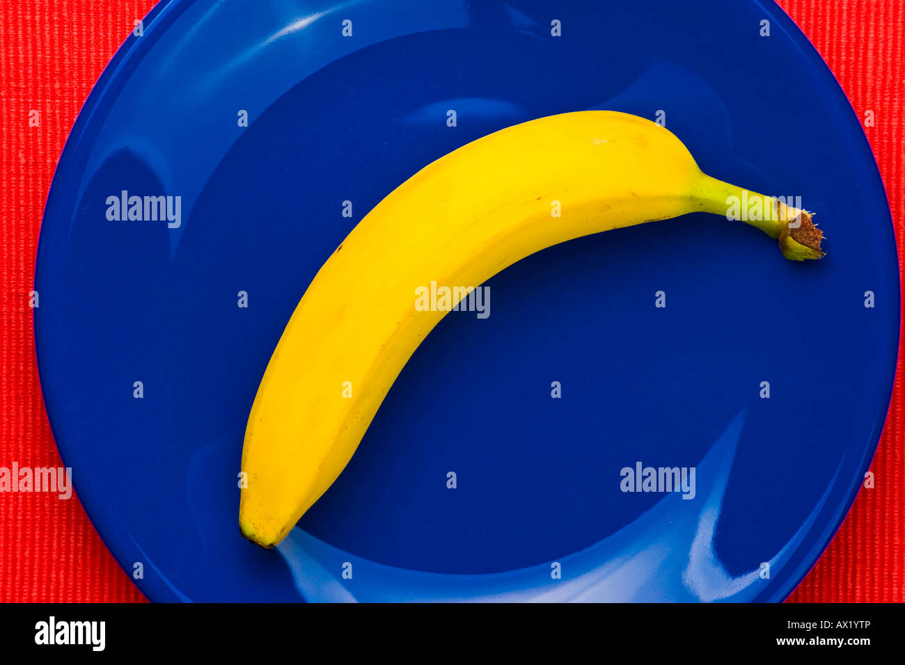 Banana on blue plate Stock Photo