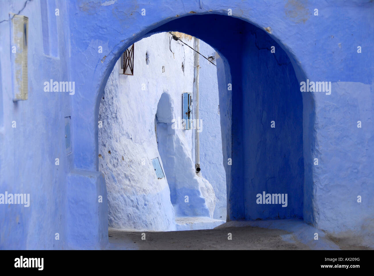 Luminous blue gate medina Chefchaouen Morocco Stock Photo