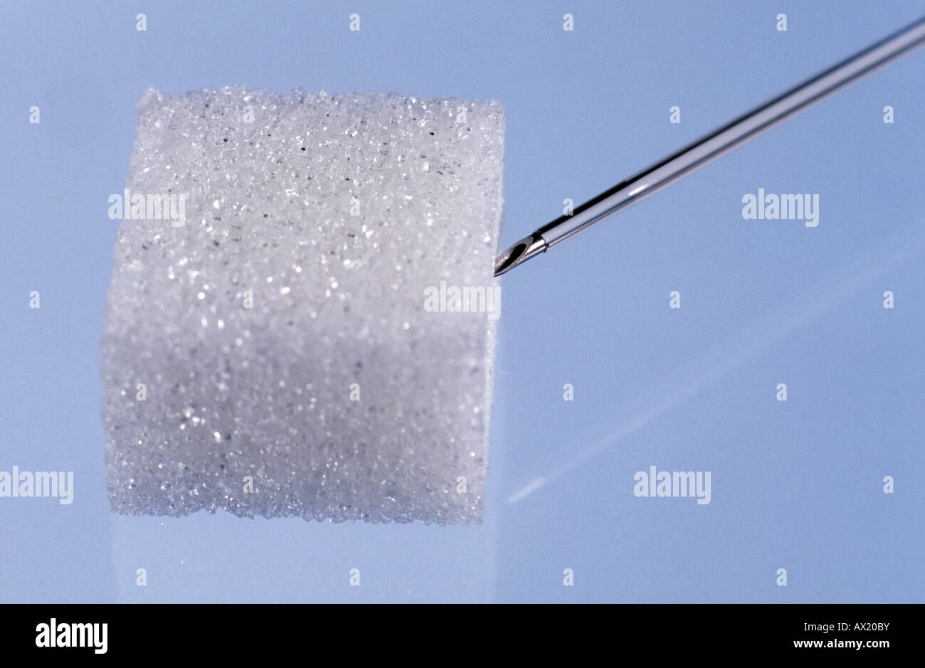 Sugar cube, needle point Stock Photo