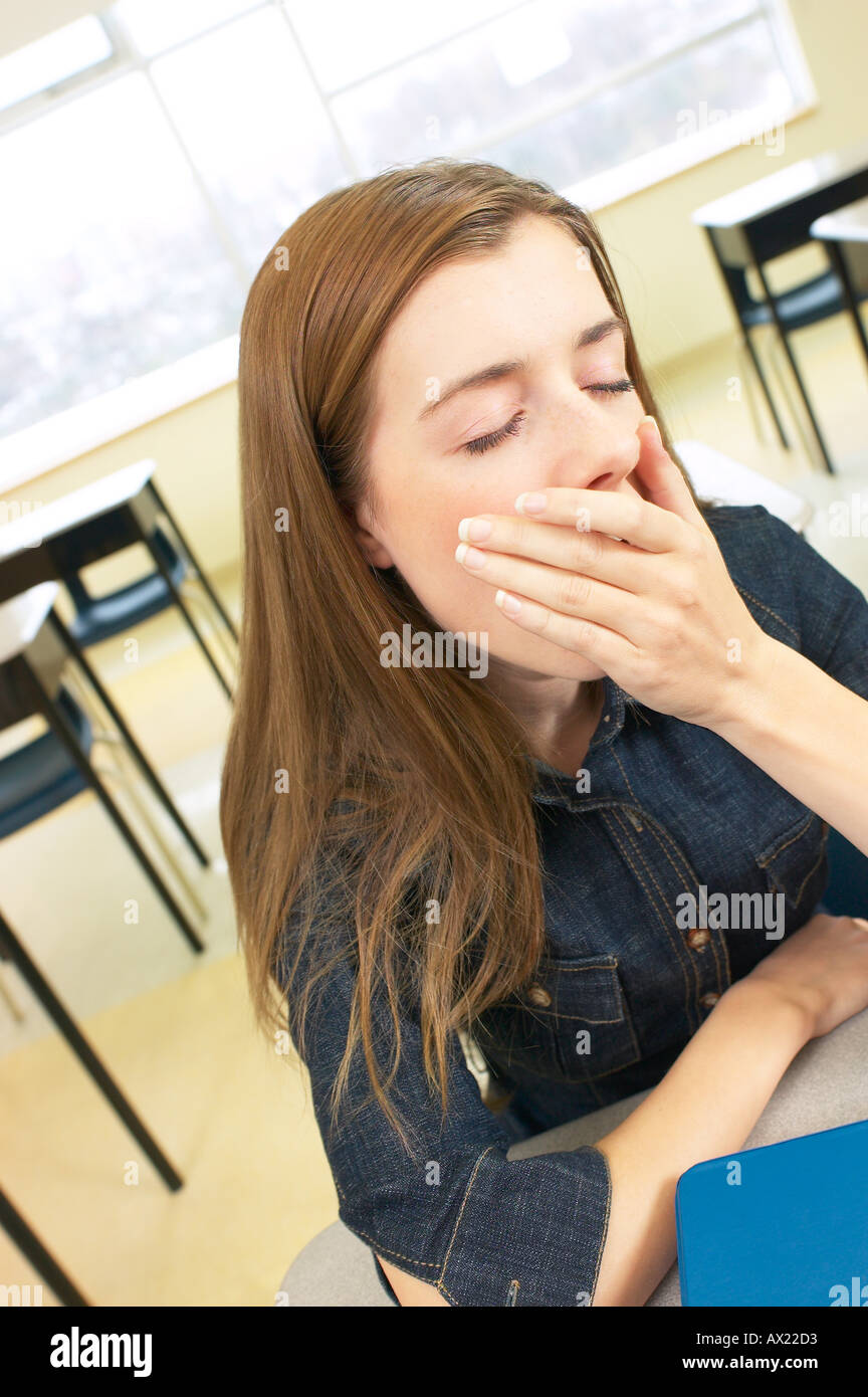 Student sitting at desk a86 Stock Photo