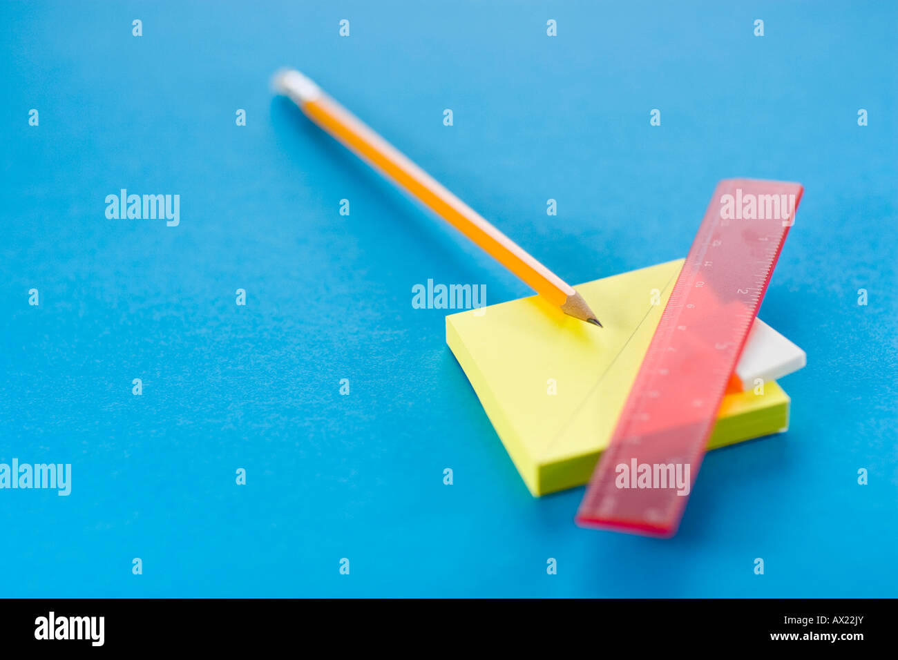 Pencil, eraser, ruler and post-it notes Stock Photo - Alamy