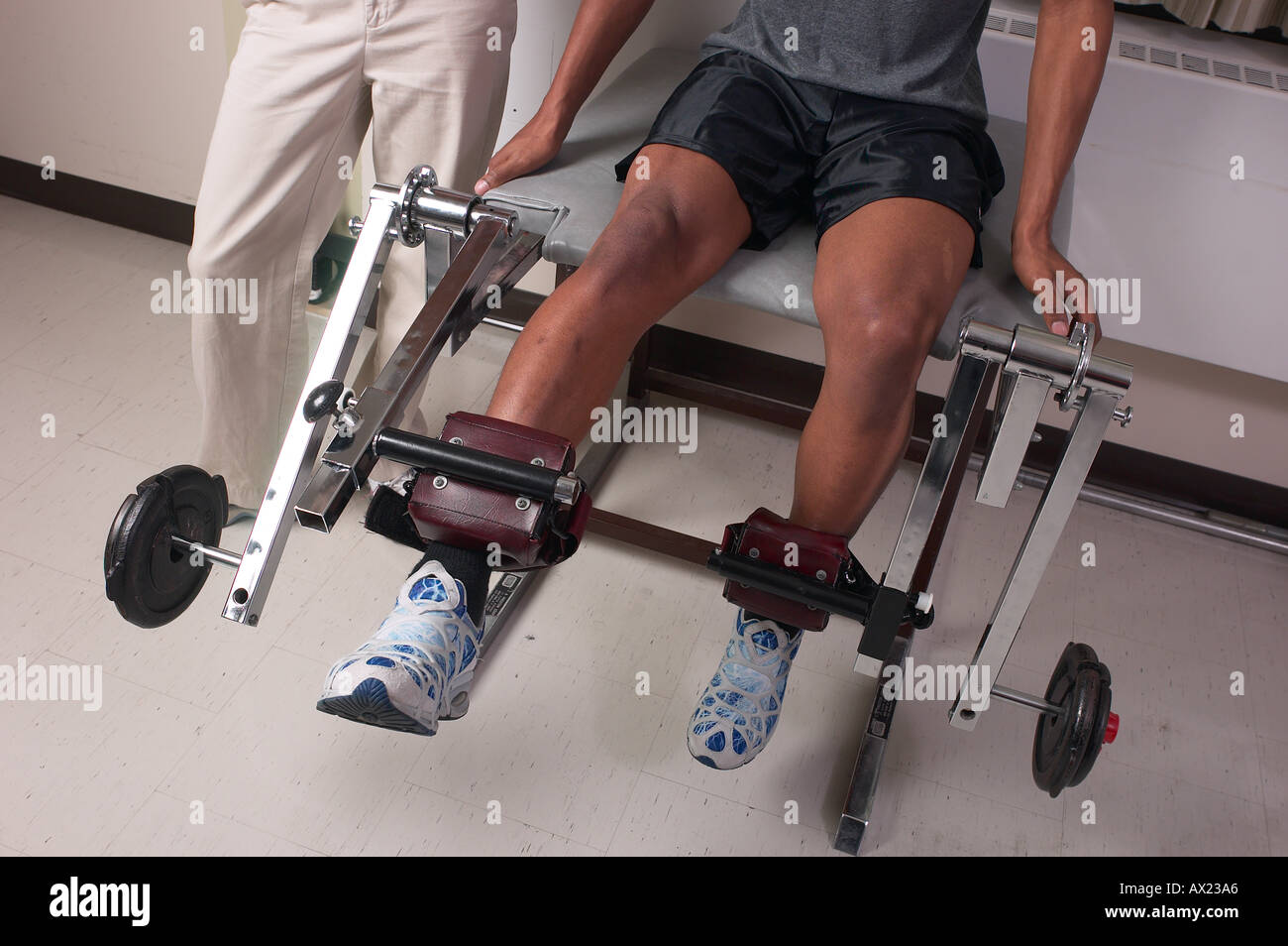 Patient using physical therapy equipment uid 1426368 Stock Photo