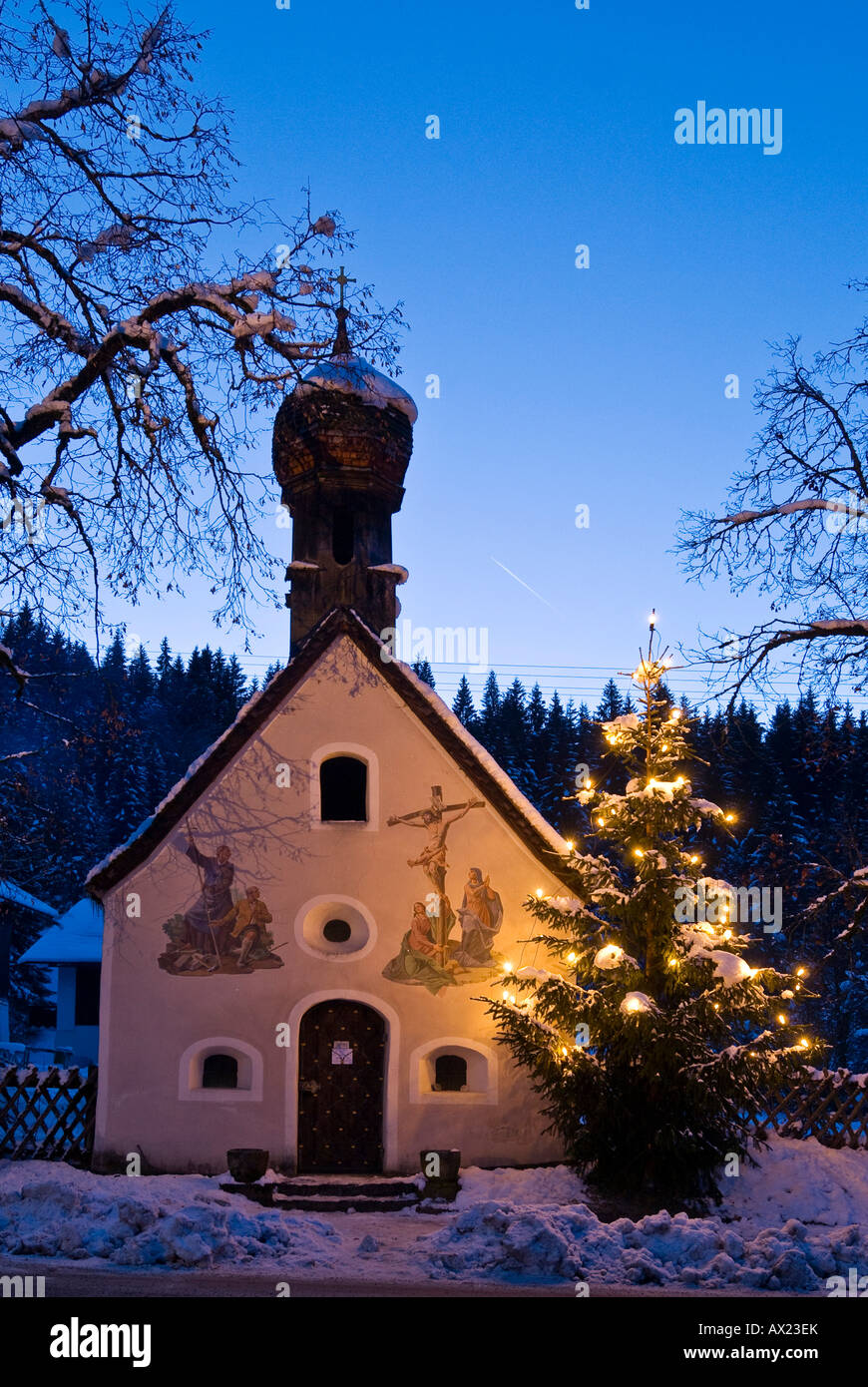 Chapel with illuminated christmas tree in Upper Bavaria, Bavaria ...