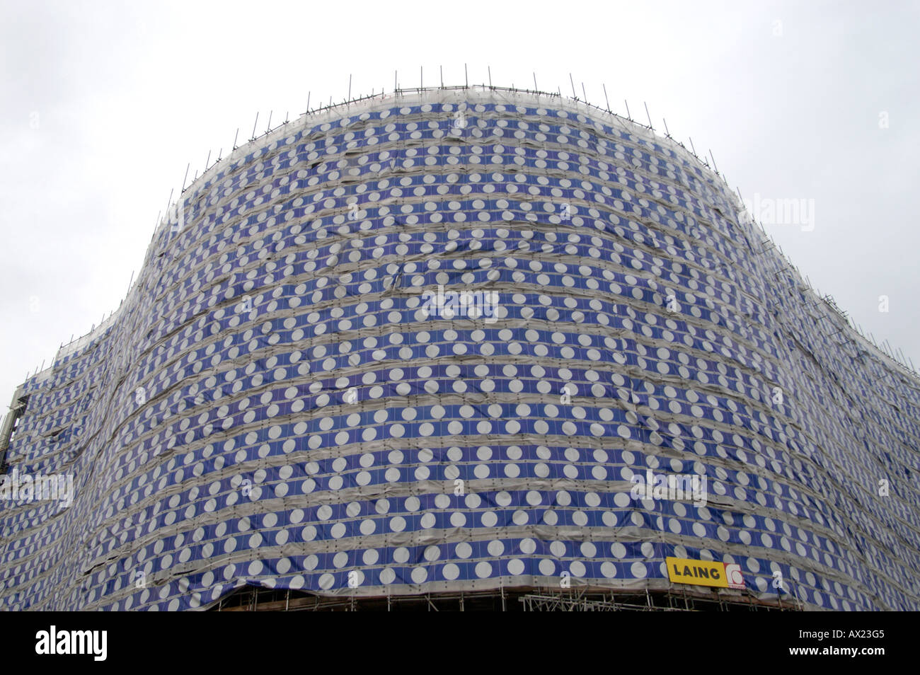 the new covered self ridges building as it was being built in Birmingham uk the covering reflected the new circular structure on Stock Photo