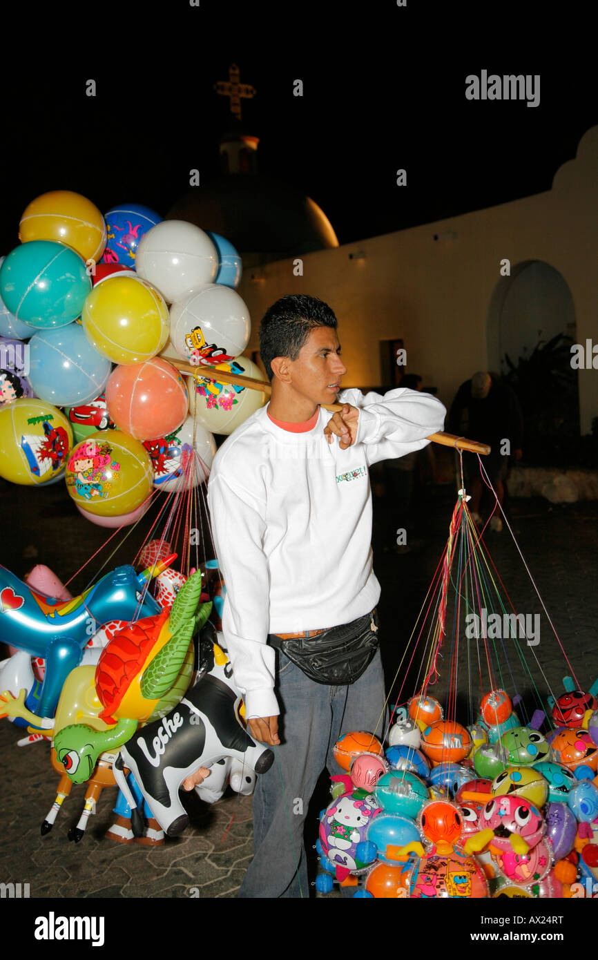 Street vendor with balloons, Playa del Carmen, Mexico Stock Photo