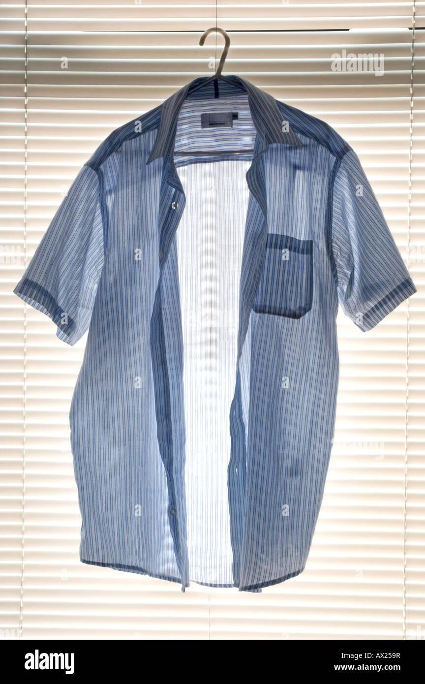 Pale blue shirt hi-res stock photography and images - Alamy