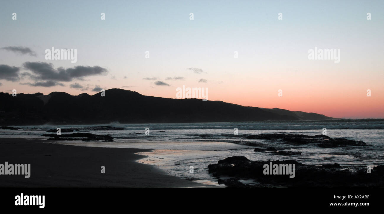 Sunset 90 mile beach Ahipara New Zealand Stock Photo