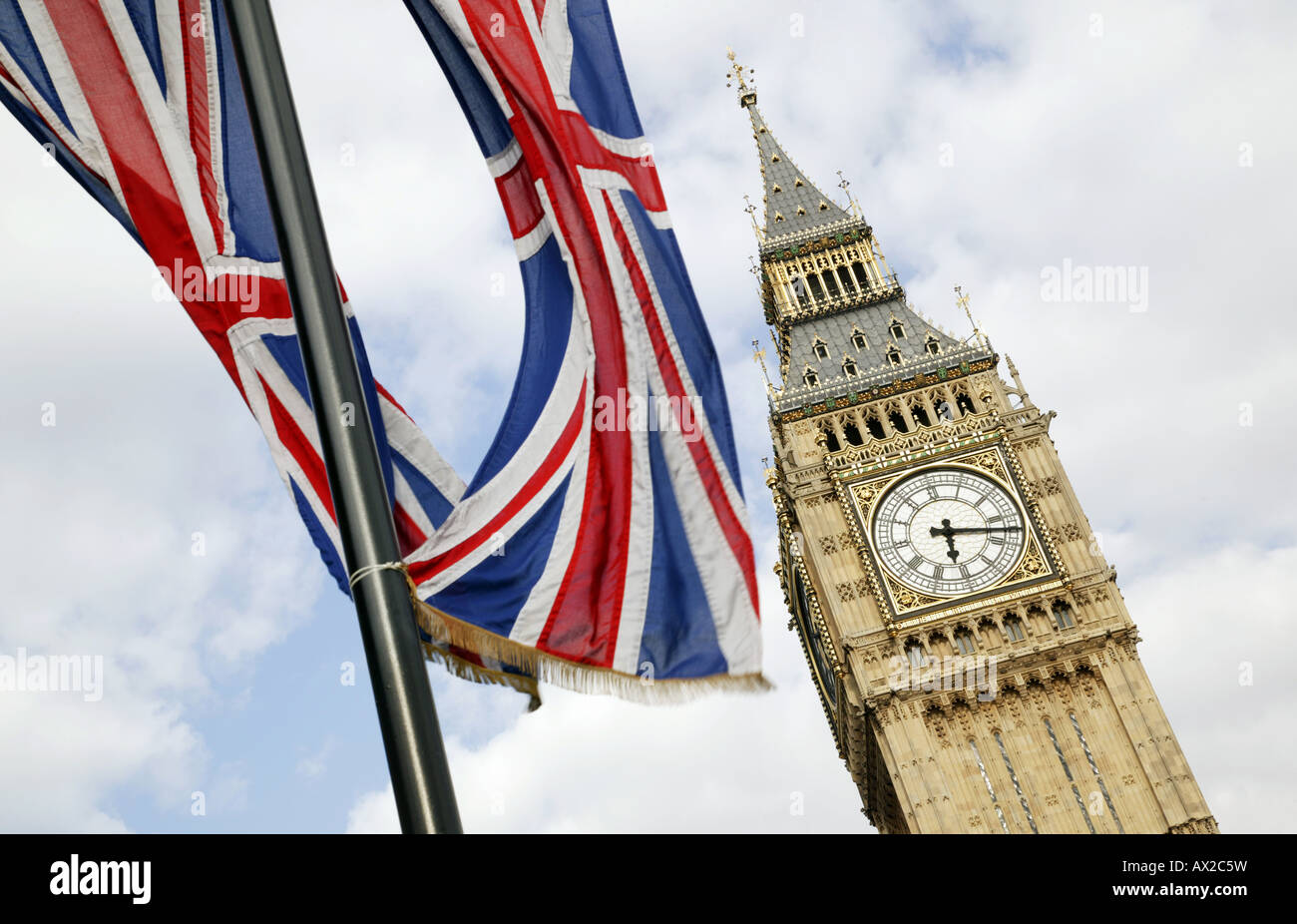 Big Ben and a Union Jack in Parliament Sq, London Stock Photo