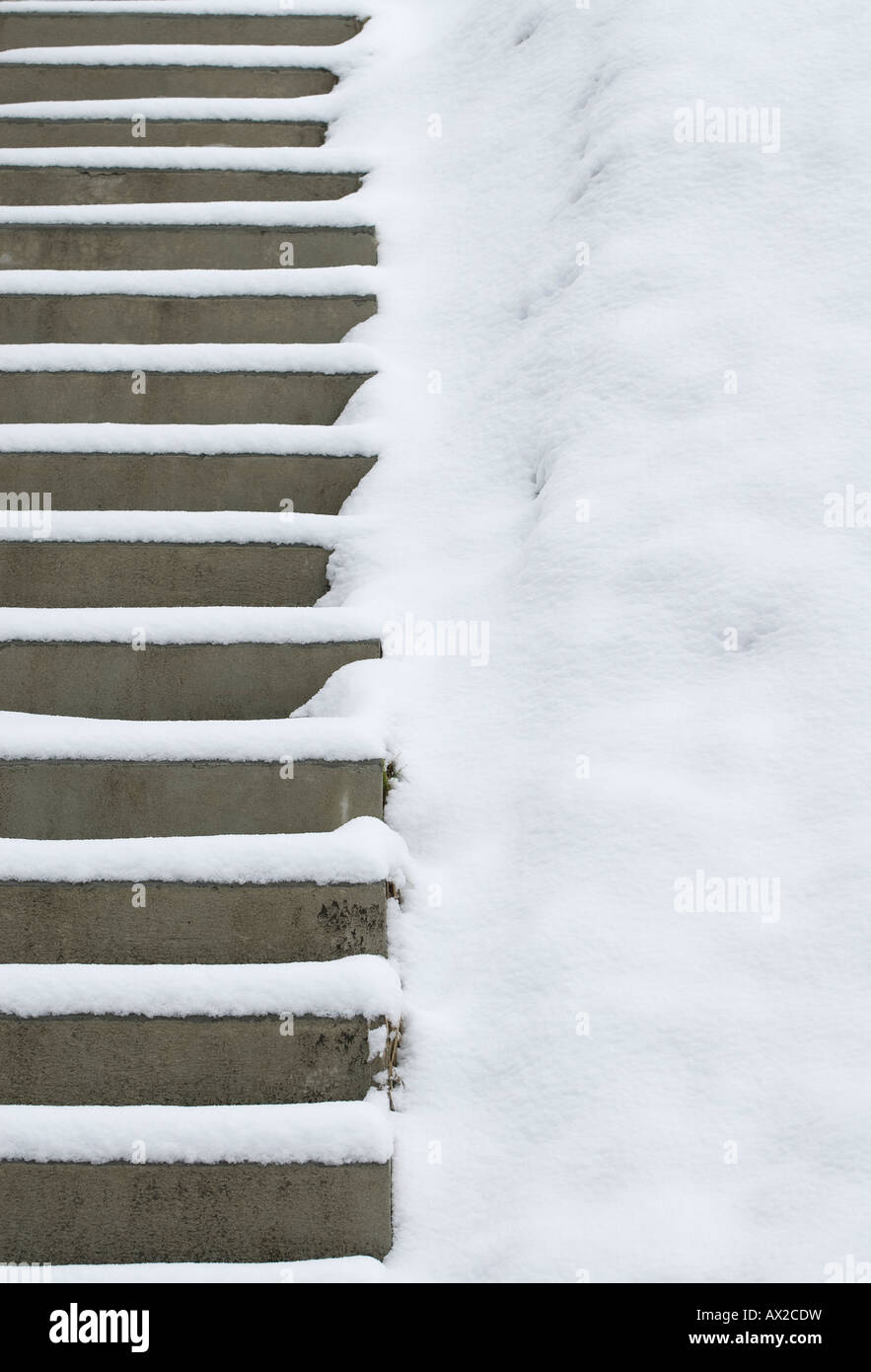 concrete steps covered in snow, chatel, france Stock Photo
