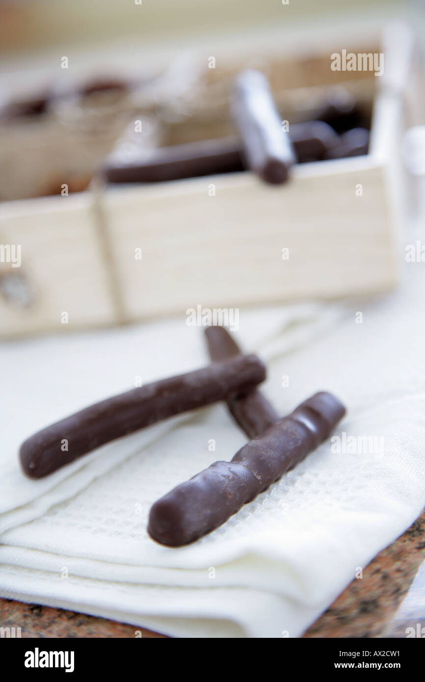 Chocolate covered orange segments on napkin Stock Photo Alamy