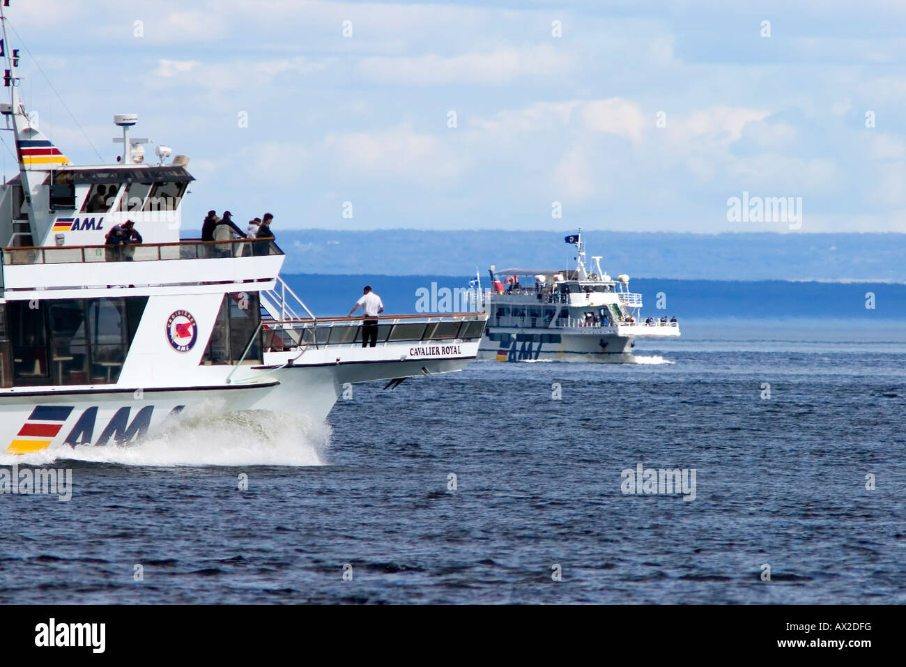 Two 'Croisières AML' whale watching cruising ships on the Saint Lawrence river Stock Photo