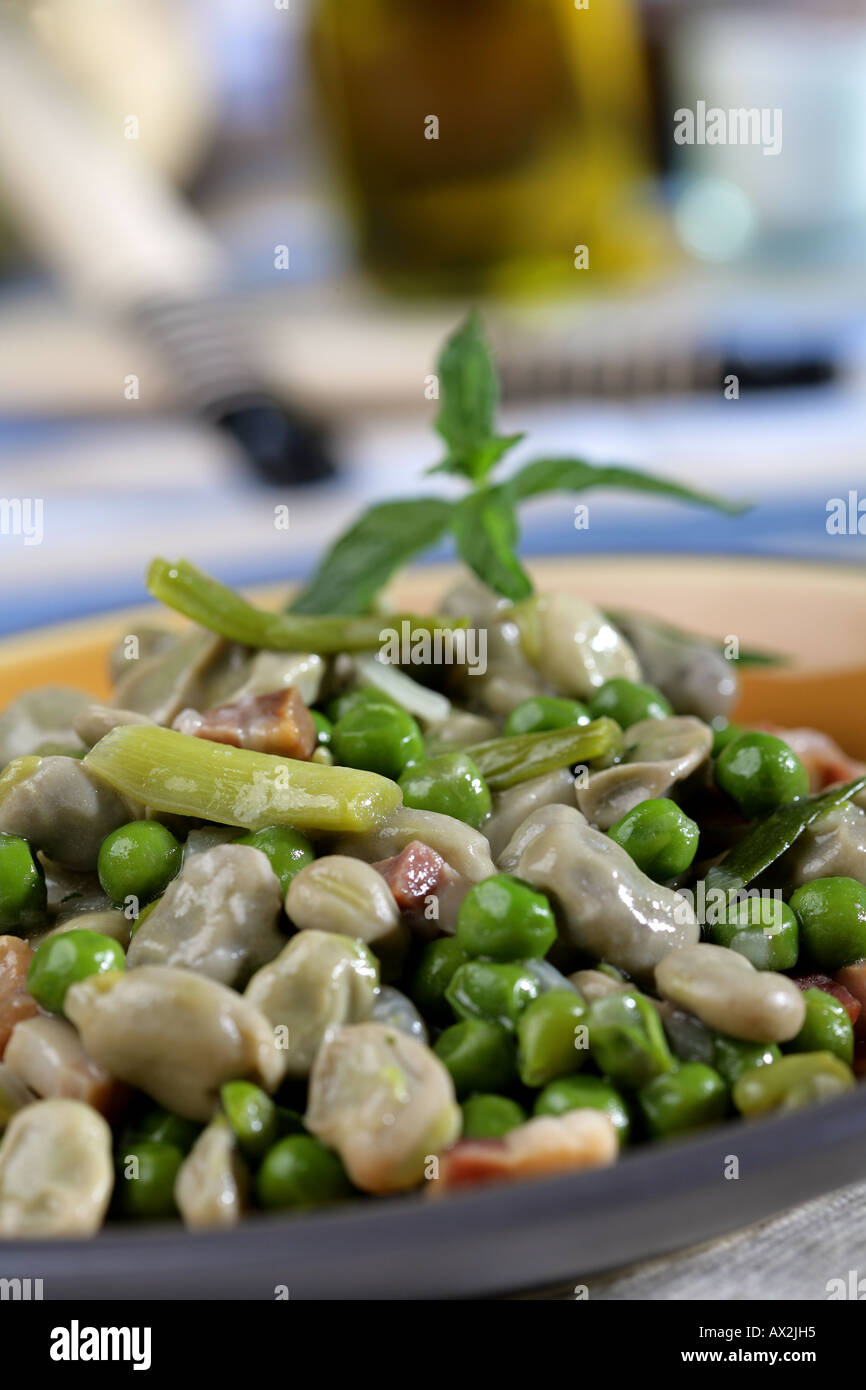 Broad beans and peas with green or spring garlics Stock Photo Alamy