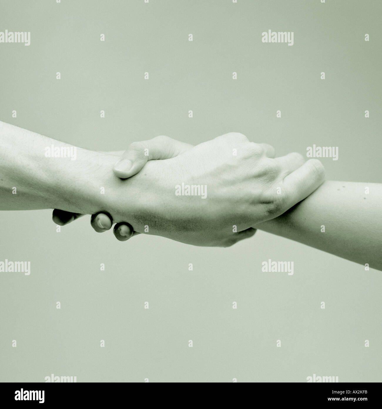 Interlocked hands Stock Photo Alamy