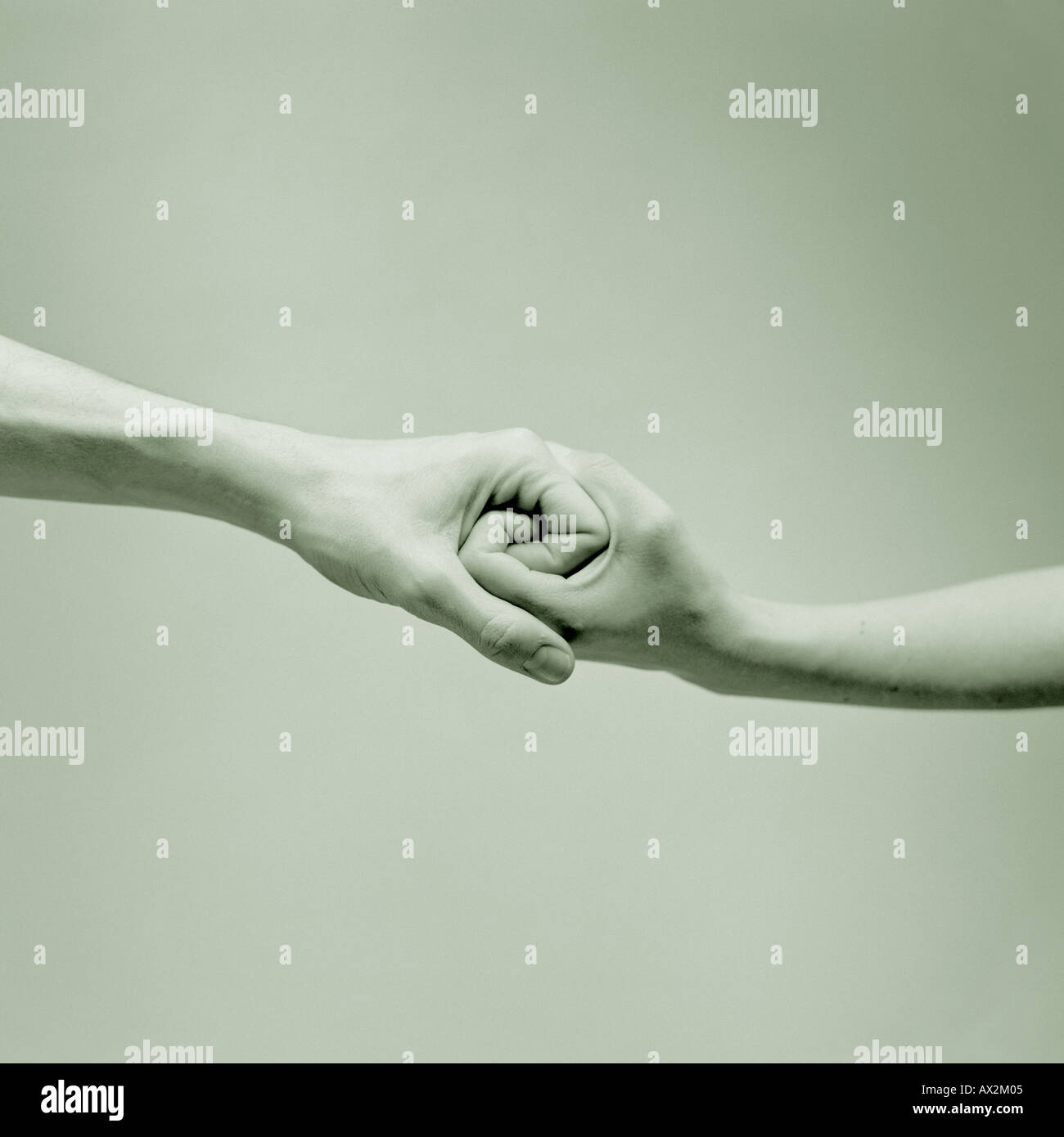 Interlocked hands Stock Photo Alamy