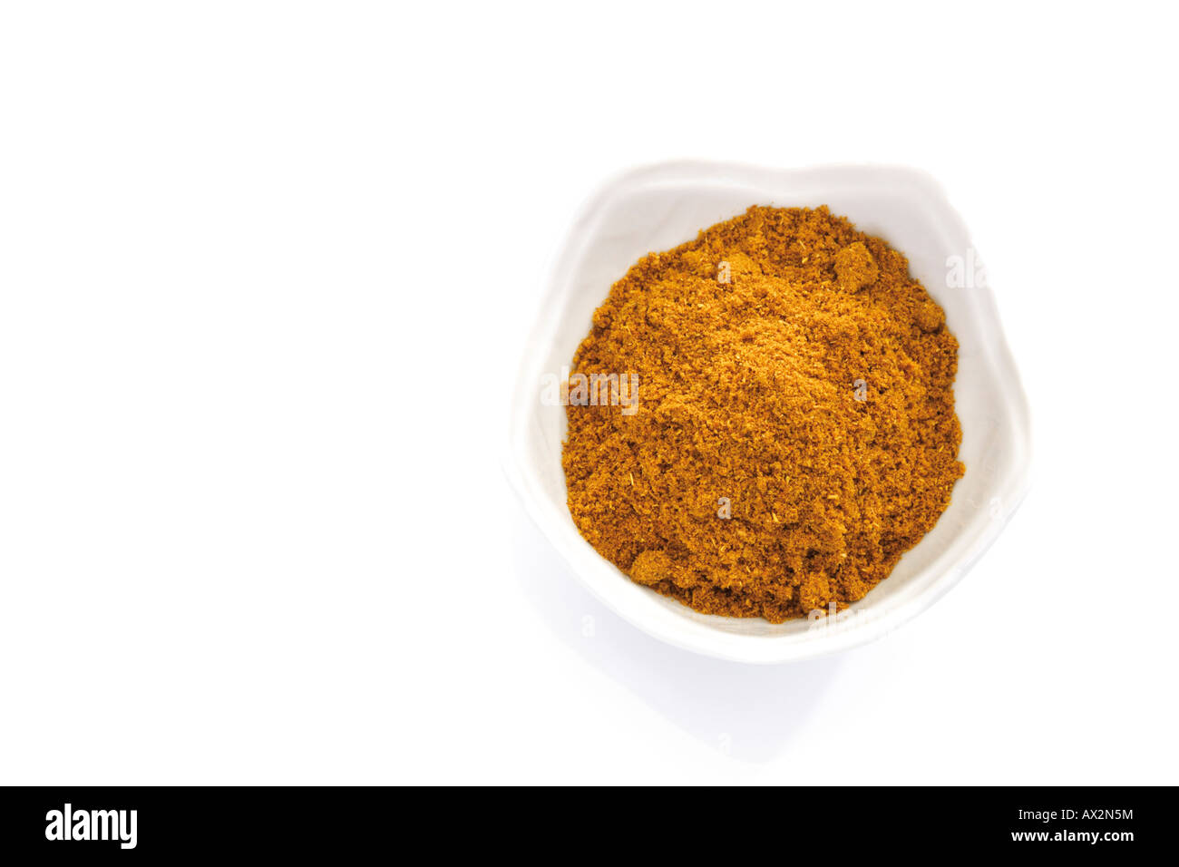 Curry powde in bowlr, elevated view Stock Photo