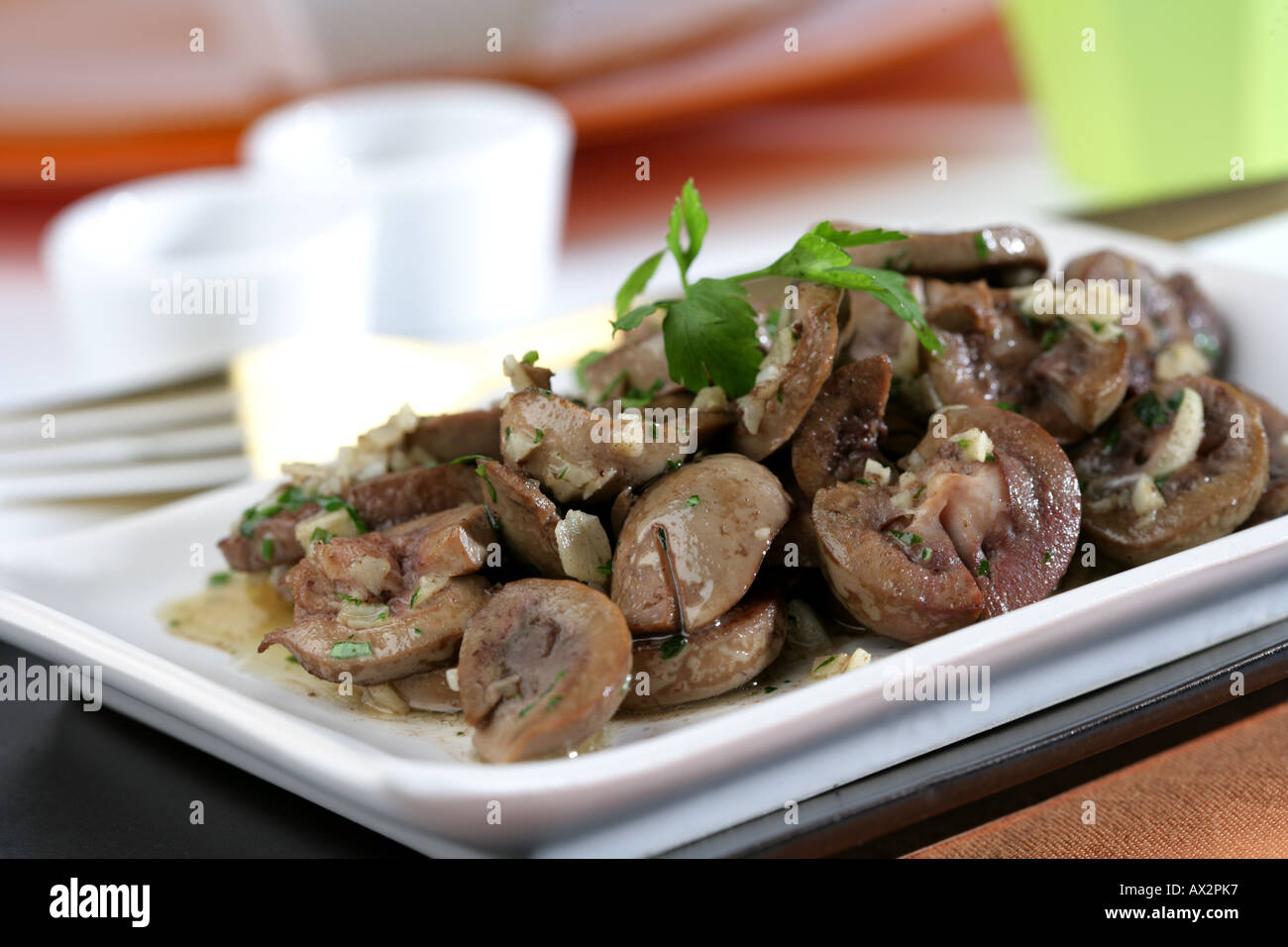 Kid kidneys with rancid wine Stock Photo Alamy