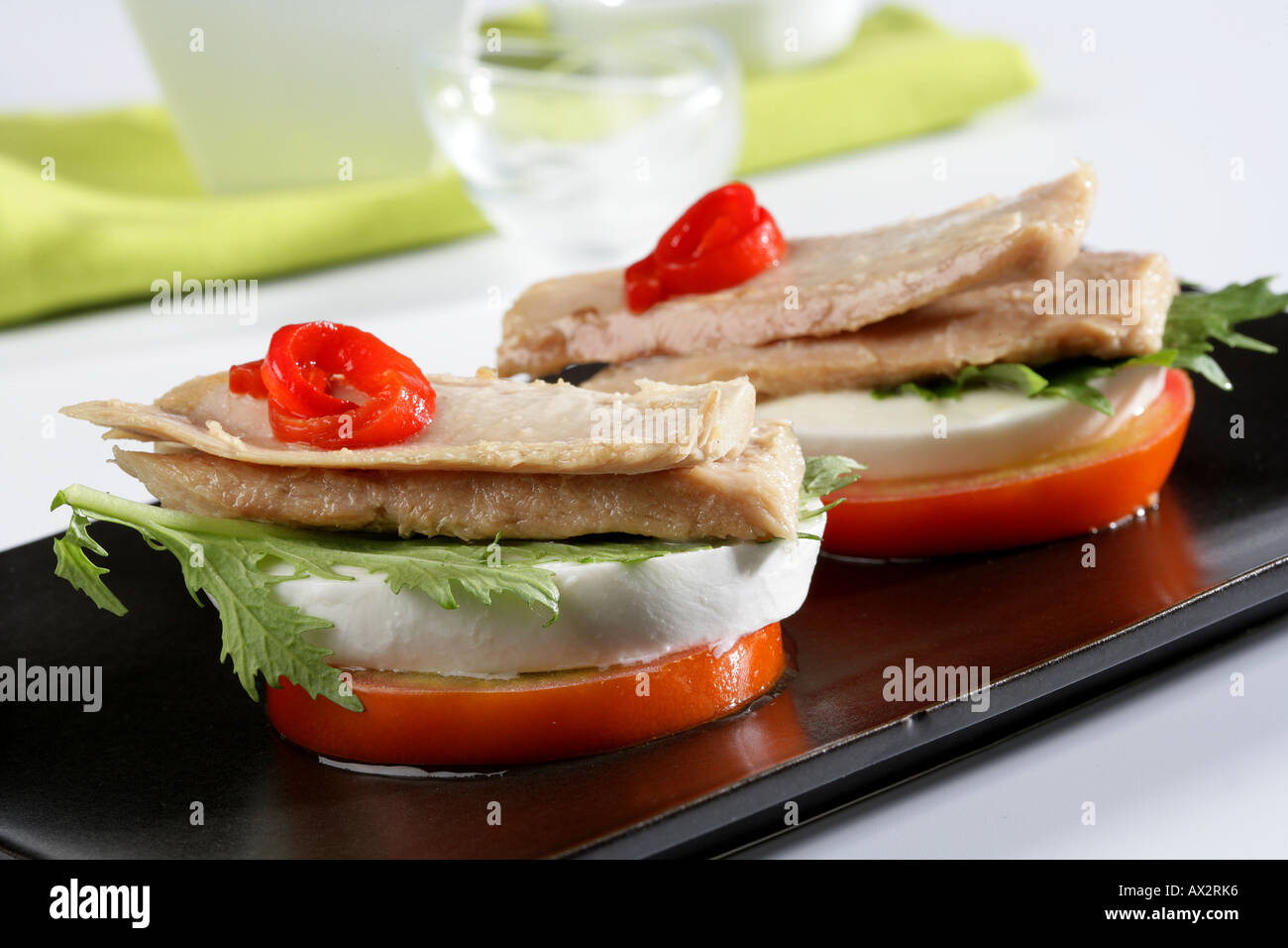 Tuna belly with mozzarella cheese and tomato Stock Photo Alamy