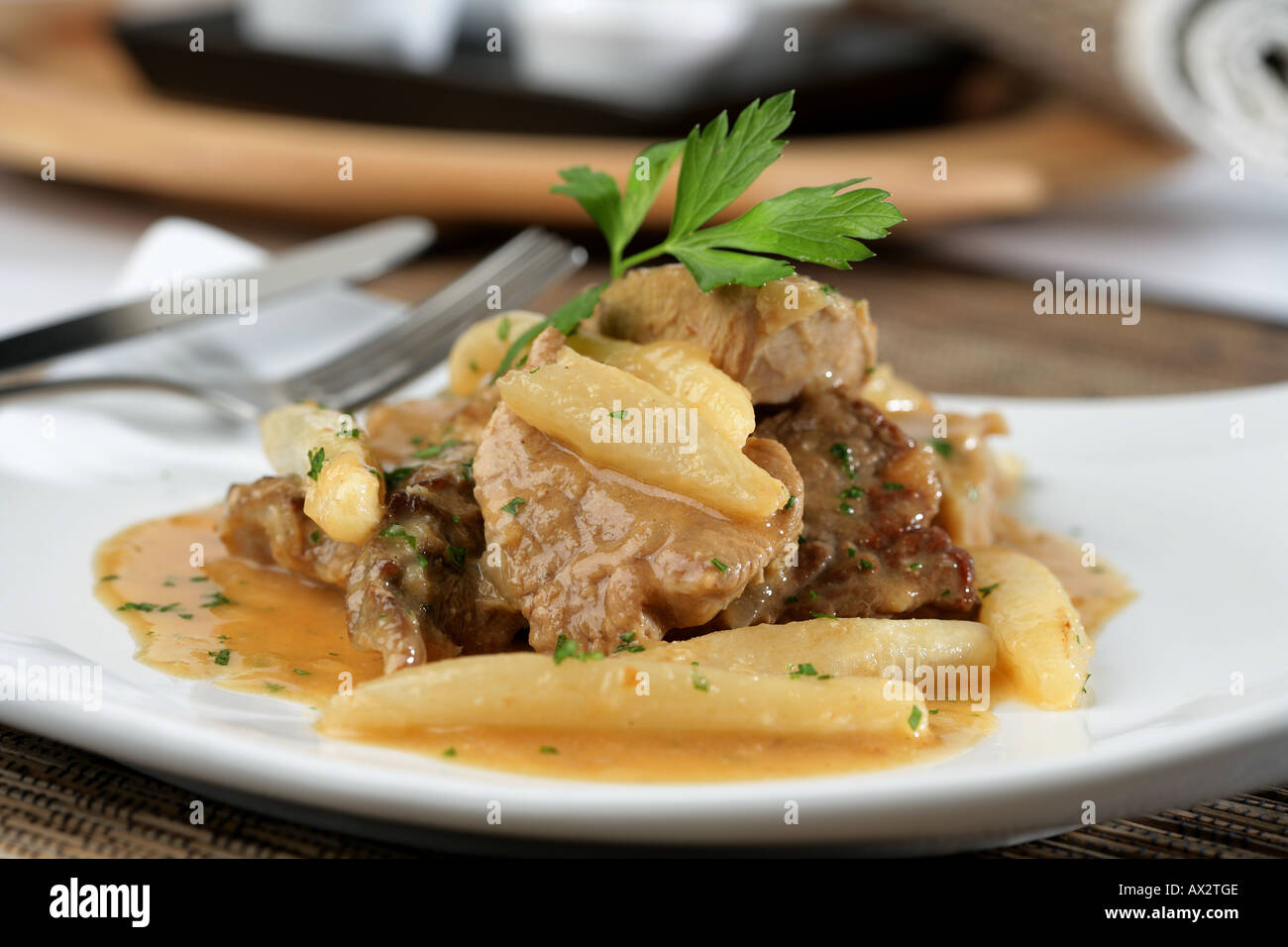 Veal with salsifies Stock Photo - Alamy