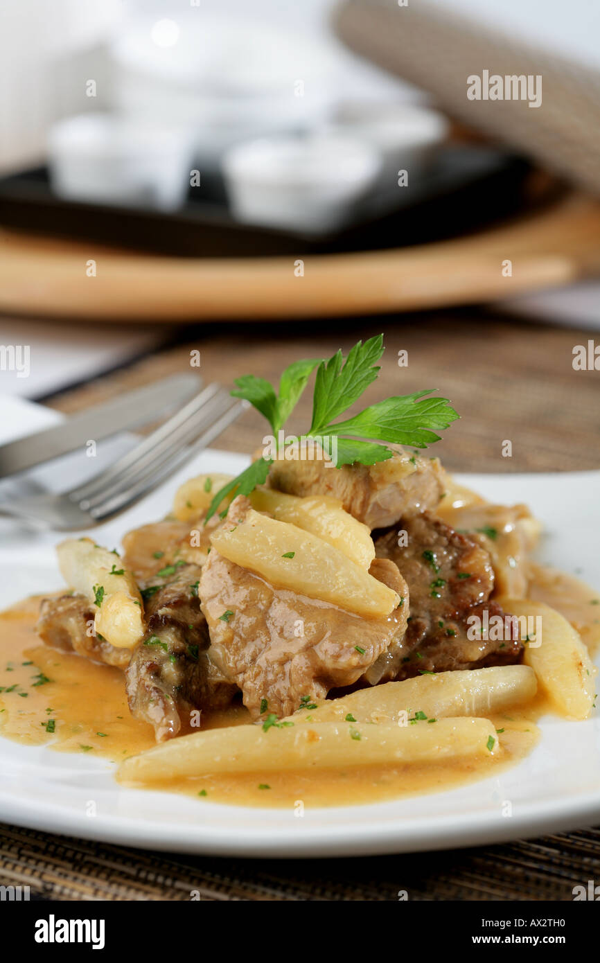 Veal with salsifies Stock Photo - Alamy