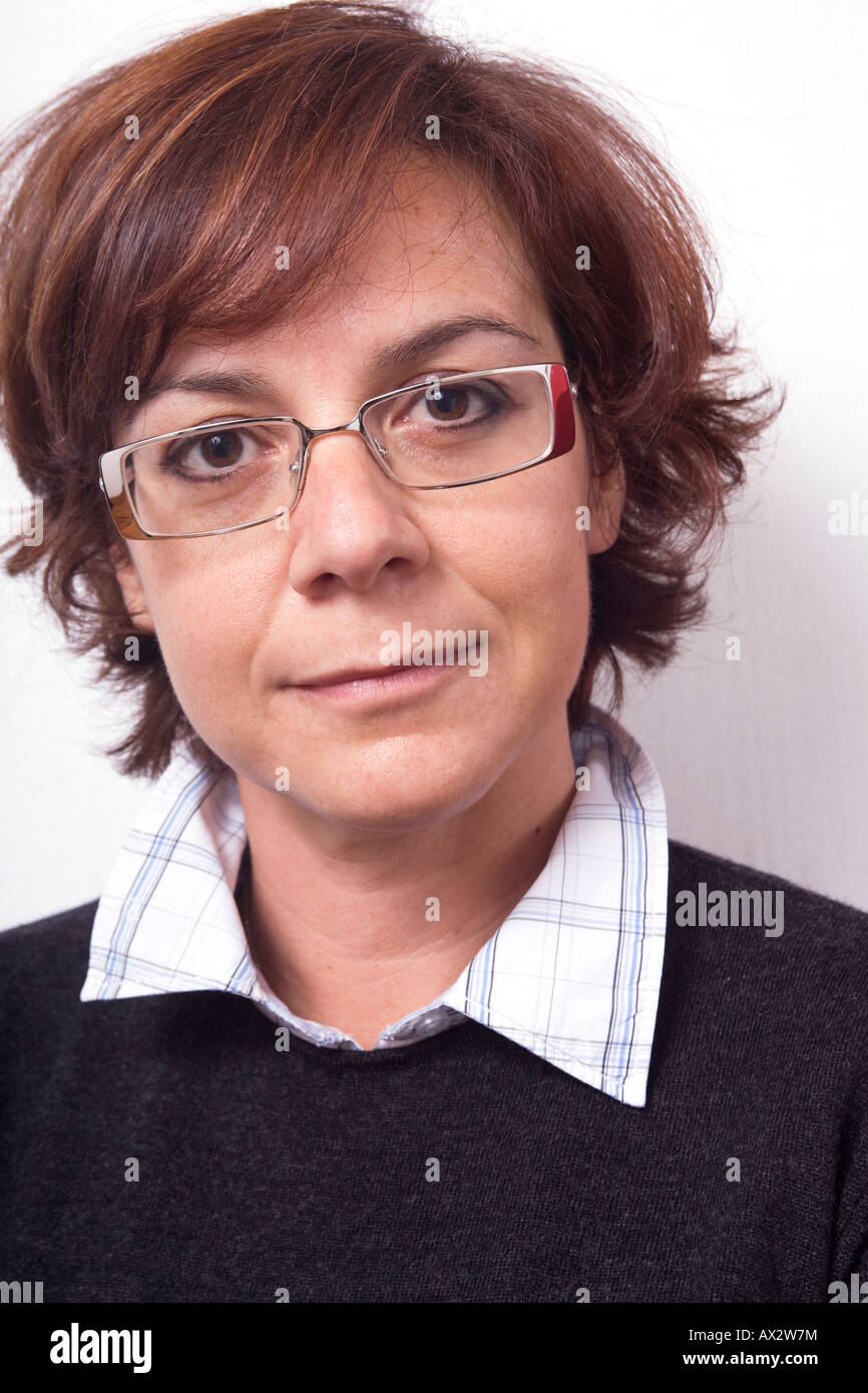 Smiling 40 Years Old Woman With Short Red Hair Wearing Glasses