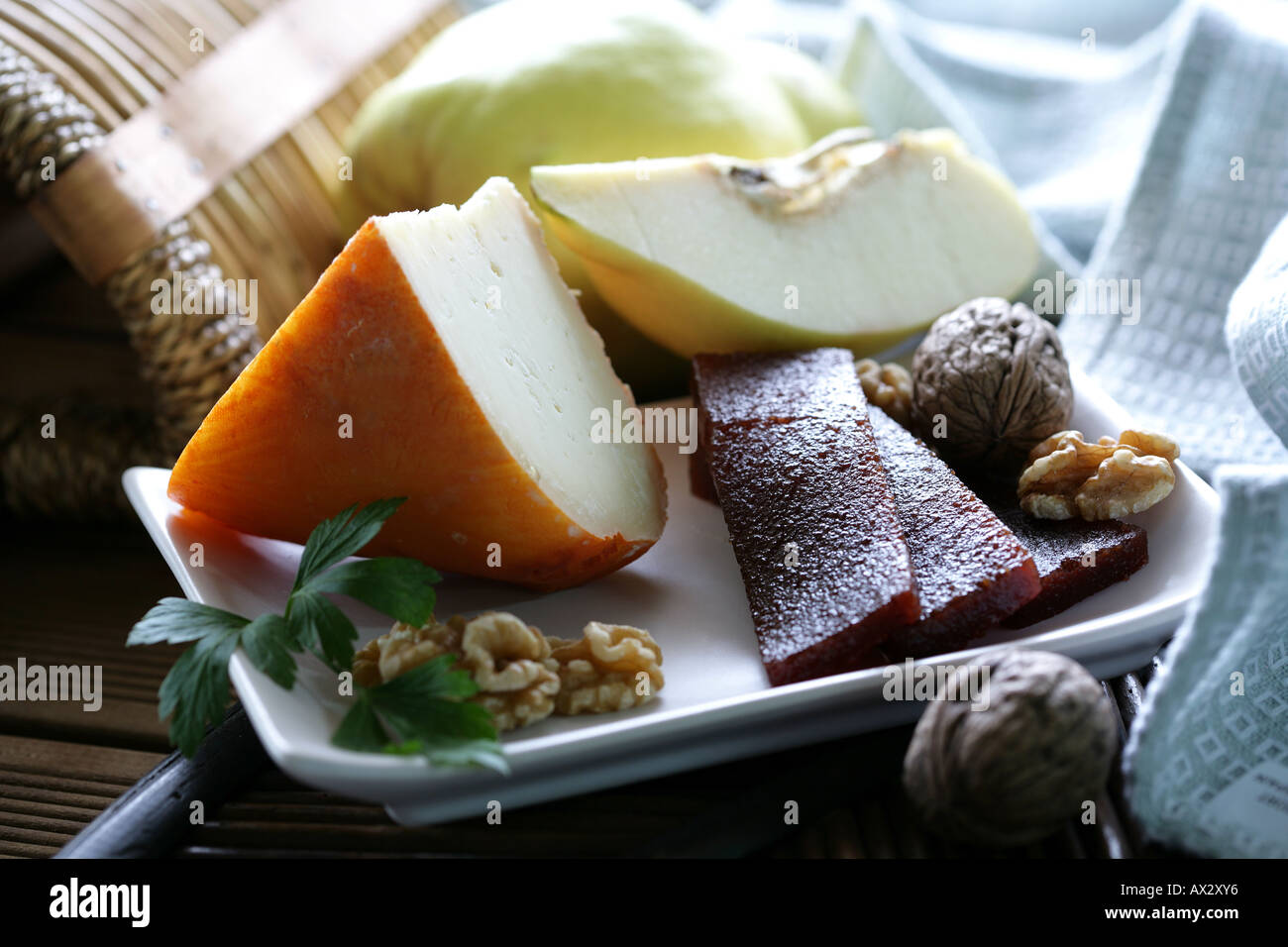 Mahon cheese quince jelly and walnuts still life Stock Photo Alamy
