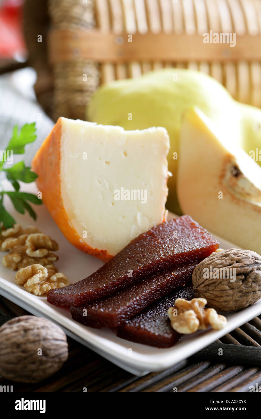 Mahon cheese quince jelly and walnuts still life Stock Photo Alamy