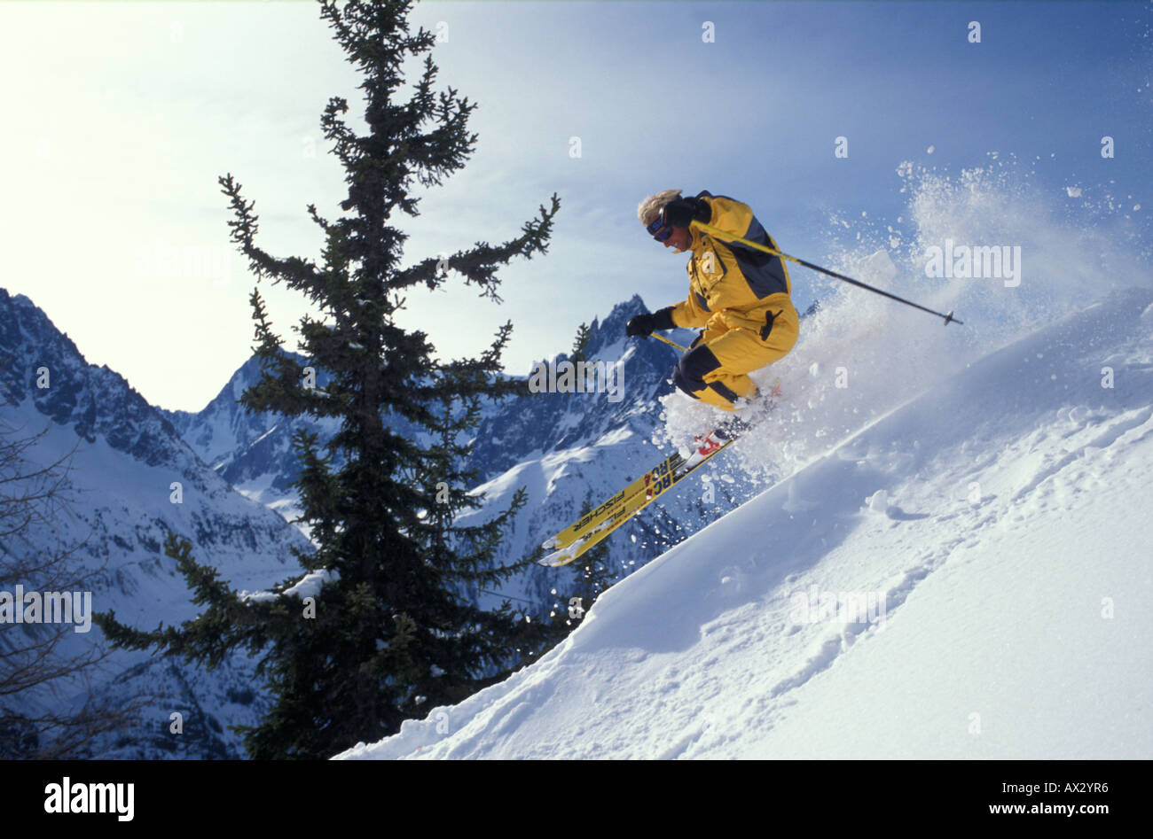 Yellow ski suit hires stock photography and images Alamy