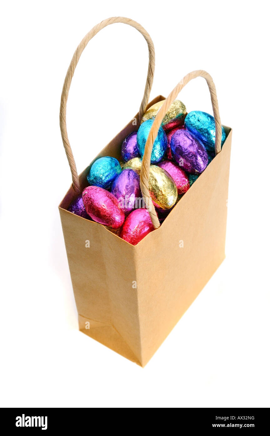 Lots Of Colourful Mini Chocolate Easter Eggs In A Small Brown Paper Bag