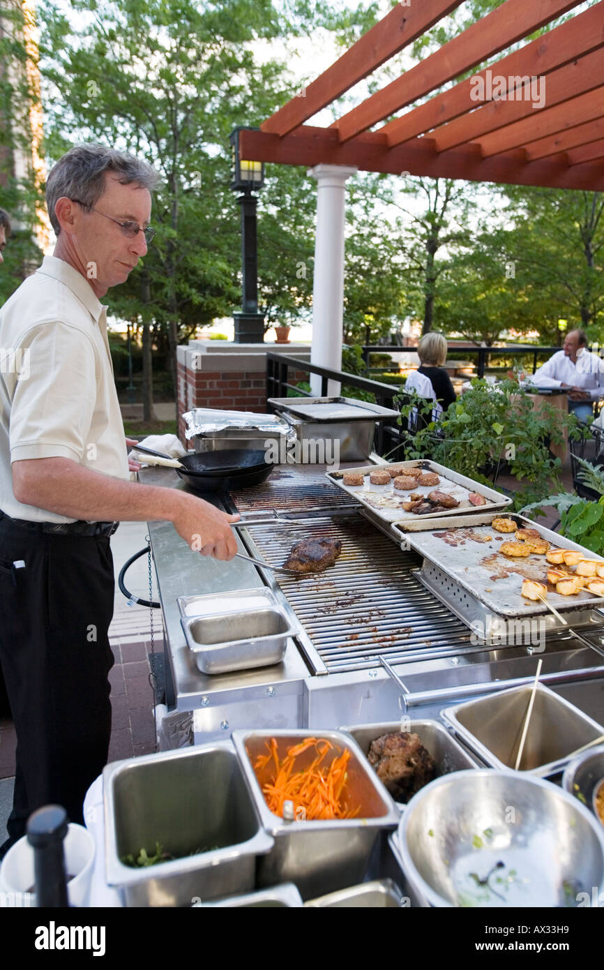 Detroit Michigan A cook at the outdoor grill of the Rattlesnake Club