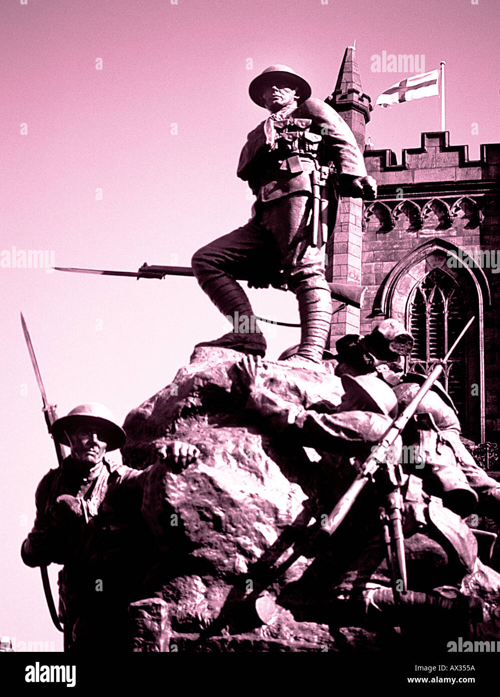Detail shot of the war memorial Oldham UK with the Parish Church behind