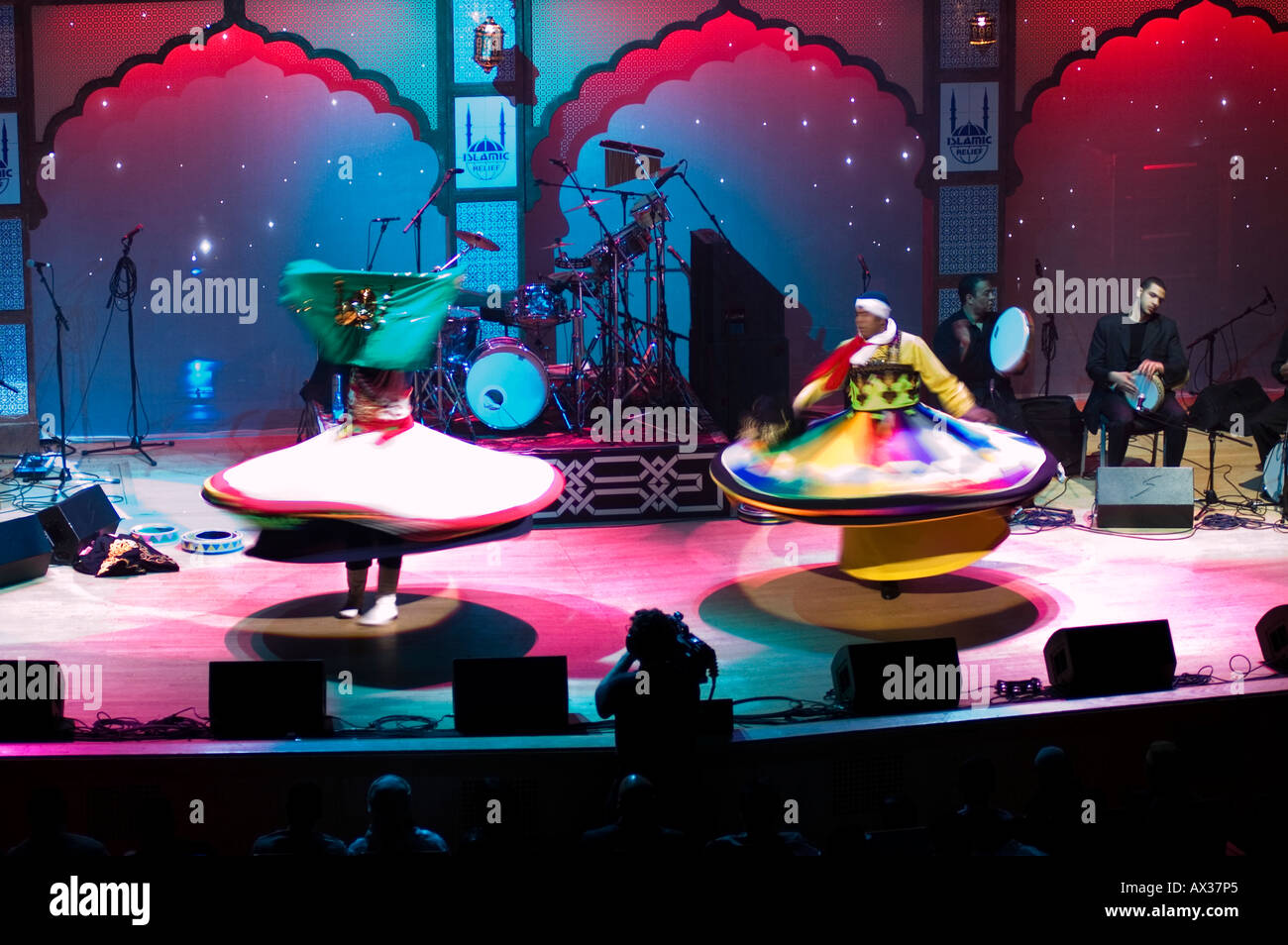 Two Arabic whirling dervishes on stage Stock Photo
