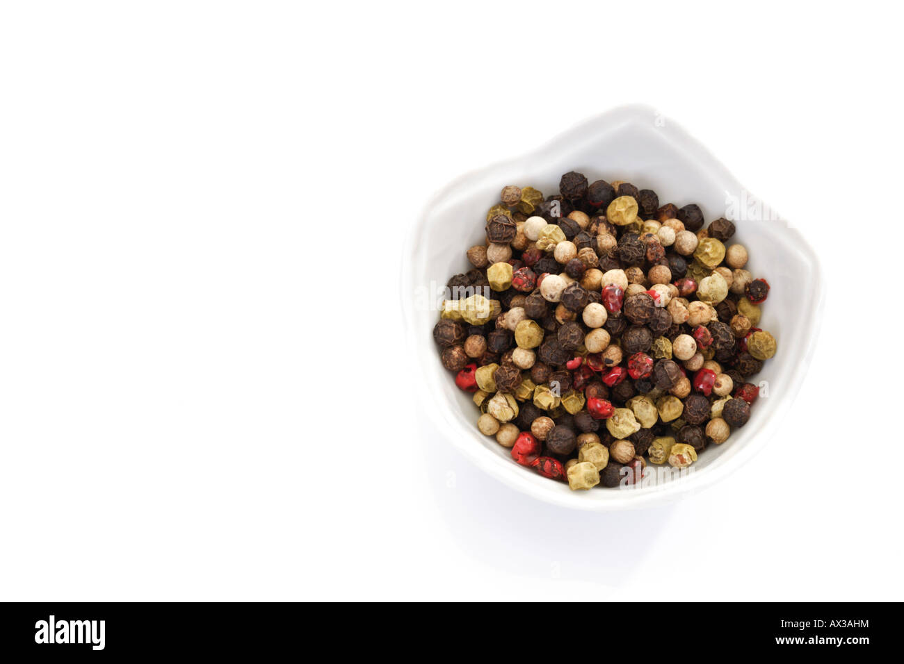 Mixed pepper in bowl, elevated view Stock Photo