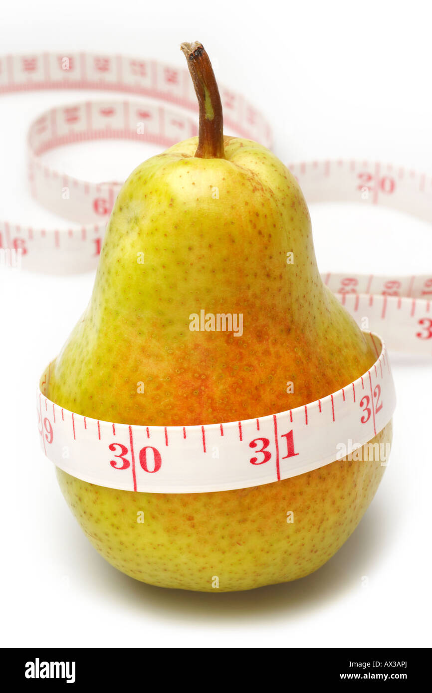 Yellow Pear with tape measure indicating weight loss Stock Photo Alamy