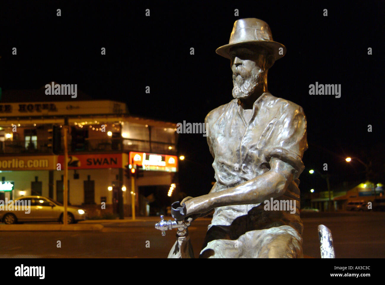 Western Australia Kalgoorlie Paddy Hannon statue at night Stock Photo