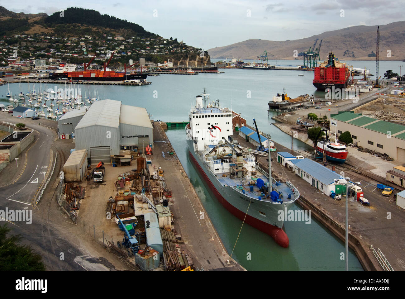 A local cement carrier about to leave the drydock at Lyttelton, New Zealand in this view of the inner harbour. Stock Photo
