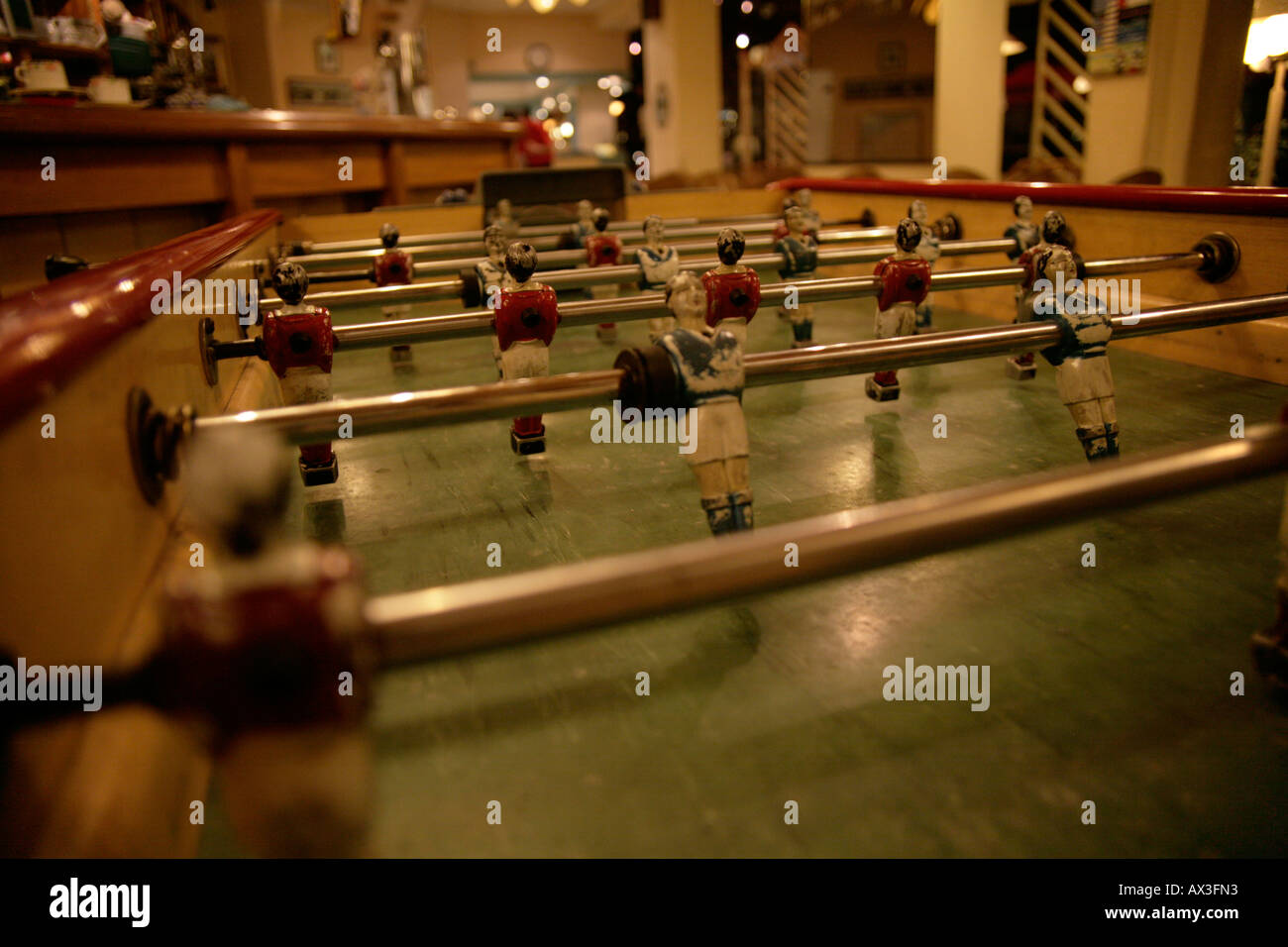 France battered bar table football game close up of player called baby foot  in french Stock Photo - Alamy