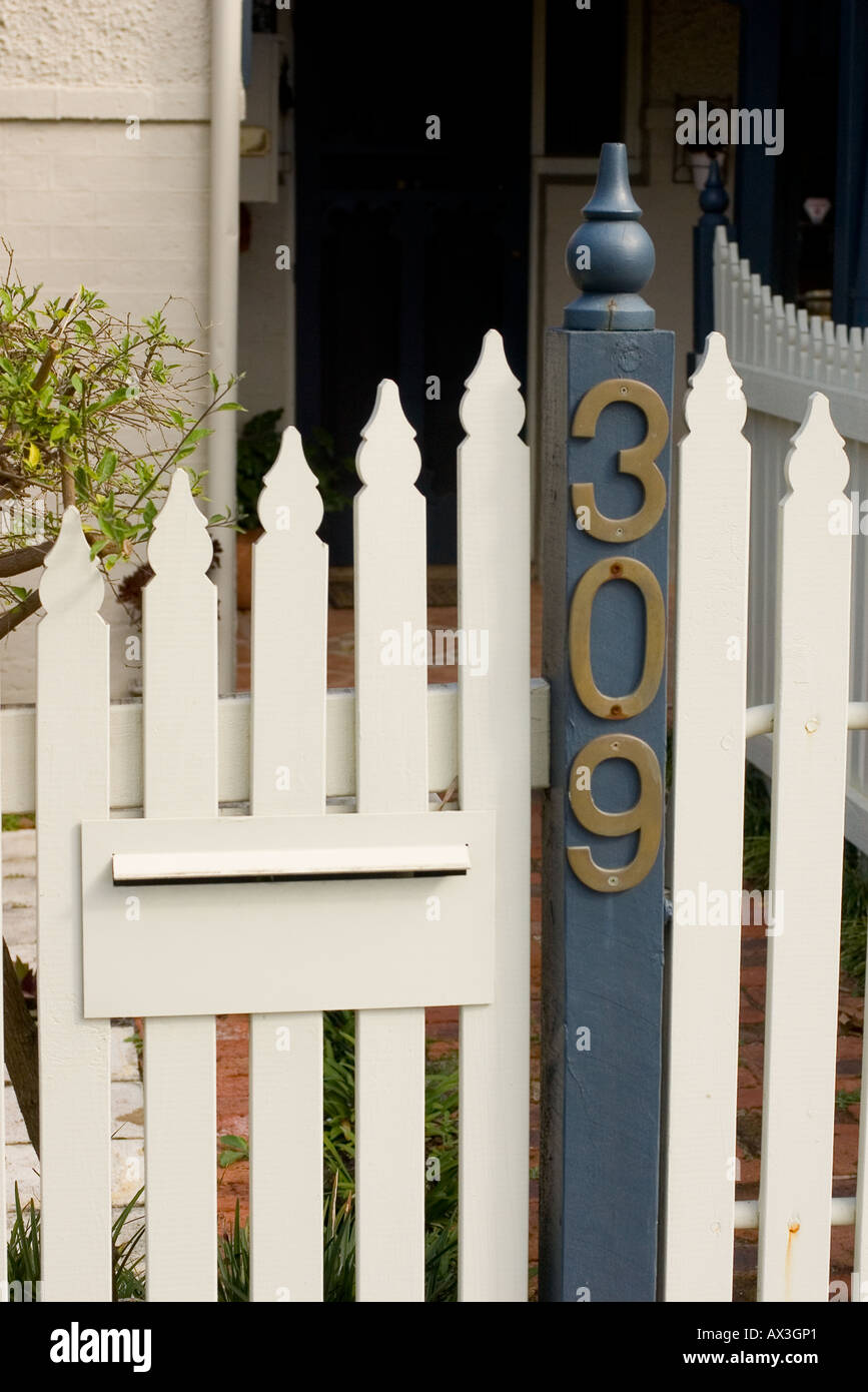 House number on picket fence, detail, number 309 Stock Photo Alamy