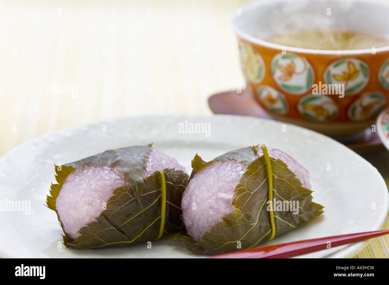Rice cake filled with sweet bean paste and wrapped in a pickled cherry
